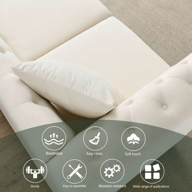 Beige velvet three-seater sofa with rolled-up armrests and rivet decorations; seats 3 people.