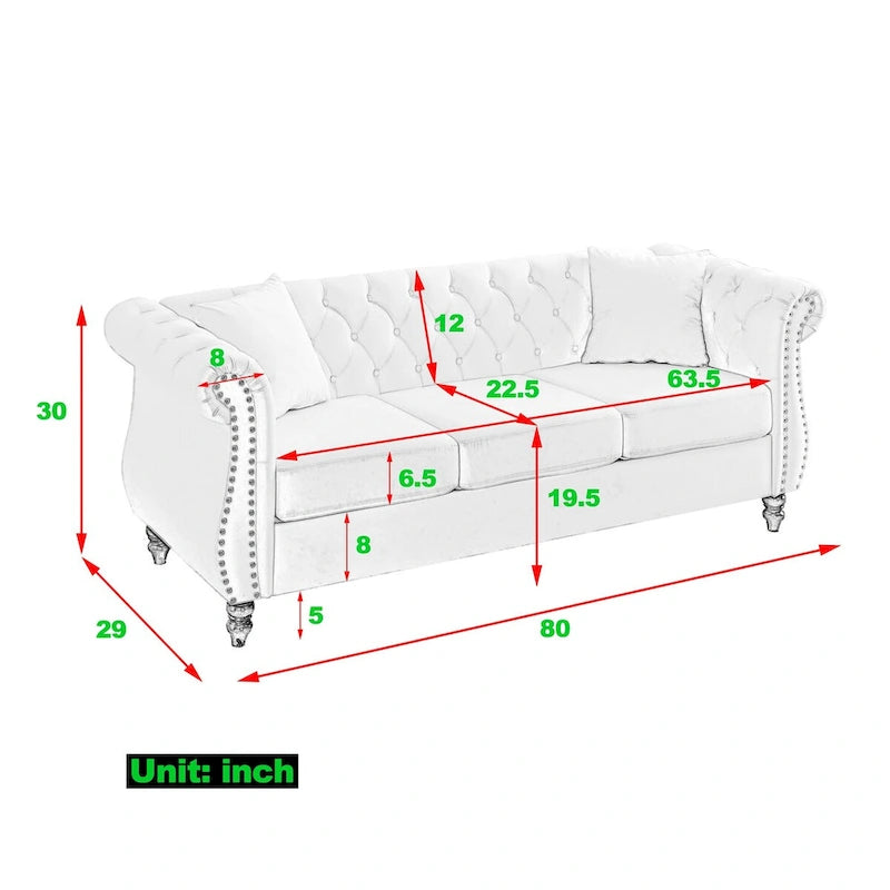 Beige velvet three-seater sofa with rolled-up armrests and rivet decorations; seats 3 people.