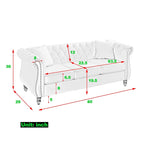 Beige velvet three-seater sofa with rolled-up armrests and rivet decorations; seats 3 people.